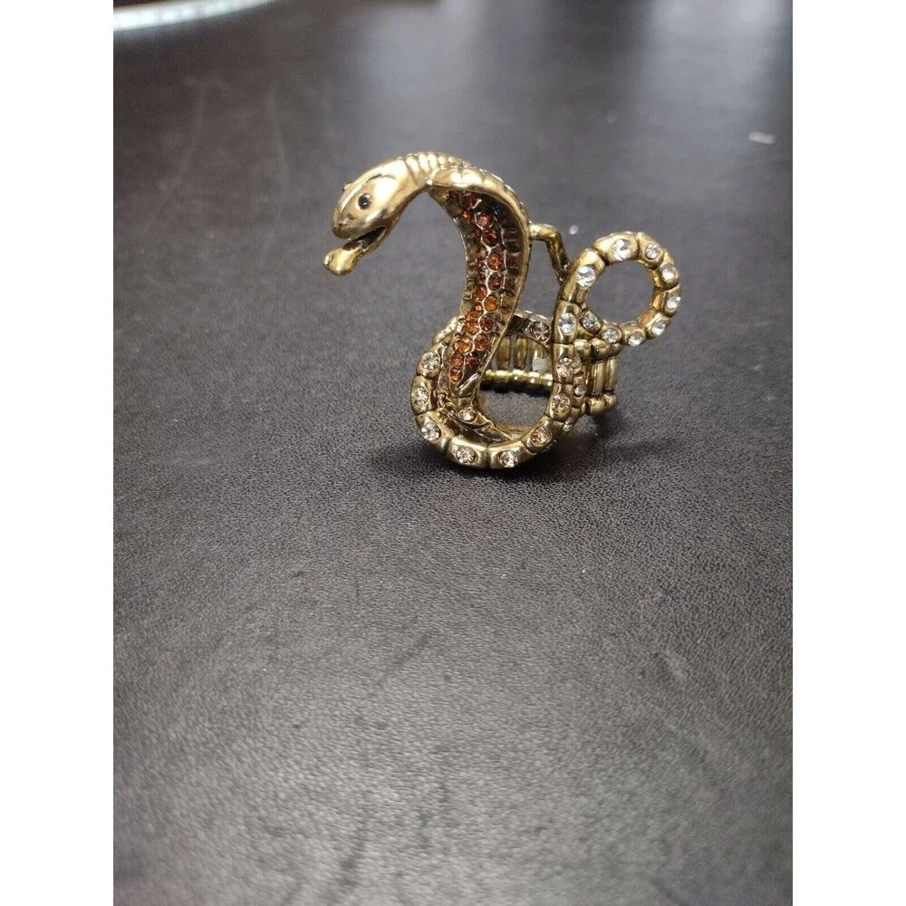 Gold tone rhinestone snake ring